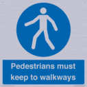 -pedestrians-must-keep-to-walkways-sign~